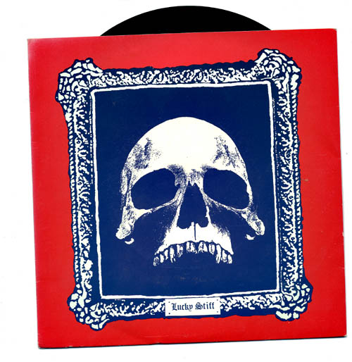 My first 7" cover. (1988) a b/w skull inside an intricate frame. Nicely contrasting against a red background.